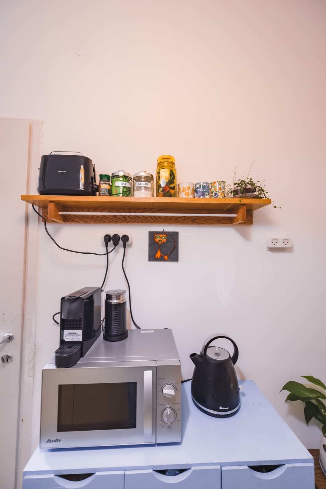Coffee station with espresso machine, kettle, toaster and microwave for early pilgrimage mornings